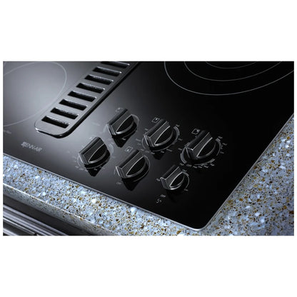 Close-up of the user-friendly controls on the Jenn-Air JED3536WS electric cooktop in stainless steel.